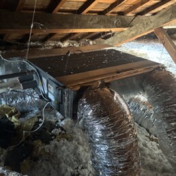 Gainable Mitsubishi Electric et plénum Airzone dans les combles à Francheville, Fontherm